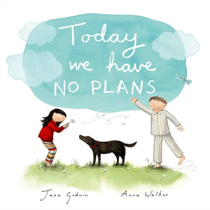 Cover of a book with an illustration of a boy and a girl playing with a dog in their pyjamas